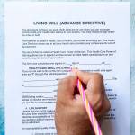 Person filling out Advance Directives paperwork