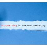 Torn paper revealing quote saying 'Storytelling is the best marketing.'
