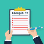 Person filling out complaint form